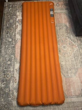 Inflatable Orange Camping Sleeping Pad - Lightweight Comfort integrated pump